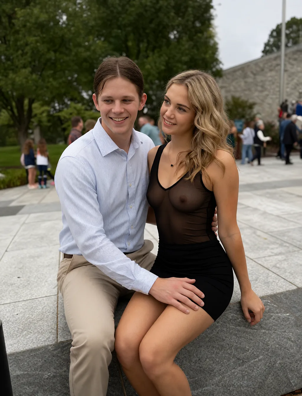 Edit the supplied photograph. Change only what is asked for below. Return one clean, natural, high-resolution photograph with realistic skin texture and no distortion. Replace her outfit with a sheer black mesh top and a matching fitted skirt. Seat her turned towards a partner whose hand rests on her upper thigh over what she is wearing; the partner wears an ordinary shirt and trousers. Keep her face, her identity, her hair and her skin tone exactly as they are, and keep the room and the light she is in.