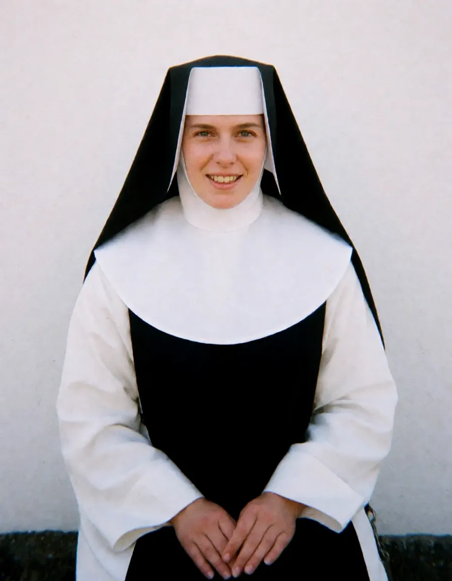 an amateur snapshot, Nun, bald, full nun headdress with wimple, coif, bandeau and guimpe, covered ears, covered neck, dark_areolae, dark_nipples, large_areolae, puffy_nipples, huge nipple rings, kneeling hands on knees, breasts_squeezed_together looking_at_viewer spread_legs spread_pussy clitoris_piercing reaching_towards_viewer maternal_smile half-closed_eyes blank_white_background, plenty of natural daylight, flat even light, casual unposed snapshot, natural everyday colour, mild noise, natural unretouched skin, strikingly beautiful, radiant complexion, early twenties